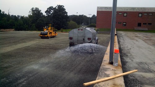 Stone Placement: Stone is then wet-rolled and compacted to achieve proper density.